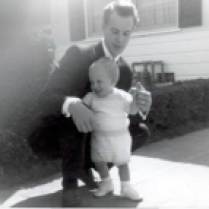 Dad in a suit that fits! Taken on or around Ray Lillie's first birthday in Inglewood, California. (May 1962 is stamped on the border of the print, but I suspect this was taken on Easter, which would explain the suit.)